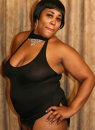 Sassy ebony BBW posing and taking a cock in her pussy by riding on top of a black hunk